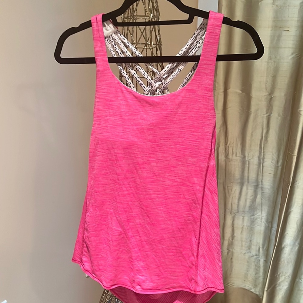 Rare! Lululemon Paris pink in the front with leopard details in back.